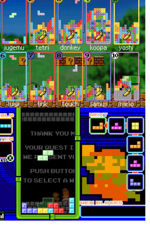 In multiplayer mode, the top screen shows opponents' play fields.