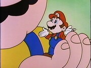 Mario in Papa's hand.