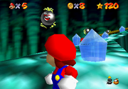 Three Amps circling around crystals in Super Mario 64.