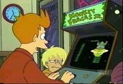 Fry playing Monkey Fracas Jr., an arcade game that features a barrel-throwing gorilla.