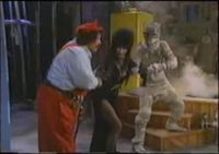 Mario and the mummy fight over Elvira.