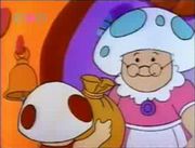 The Mushroom Nanny receives a donation from Toad.