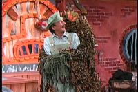The Plant Monster grabs ahold of Luigi.