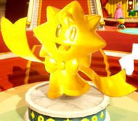 PPS Stella gold statue 1F.png