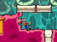 Mario hammers a Nubbin.png