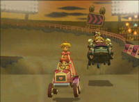 Daisy,Peach,WarioandWaluigiRacingonWaluigiStadiuminMKDDDemoMovie.png