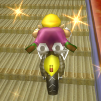 WarioBikeTrickUp.png