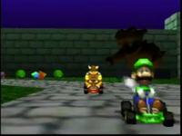 BowserandLuigiRacingonBowser'sCastleintheMK64DemoMovie.png