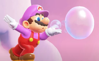 SMBW Screenshot Bubble Mario blowing.png