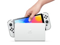 Nintendo Switch OLED In Dock.jpg